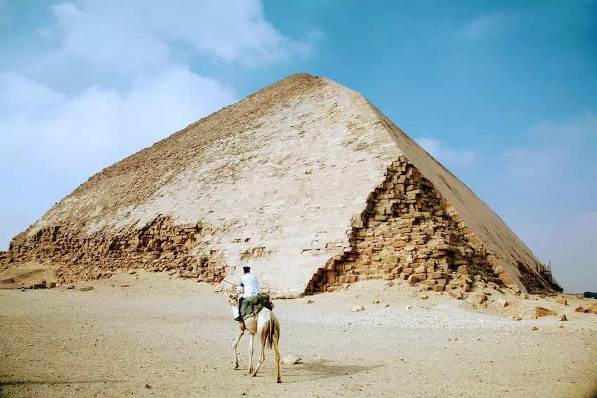 Police riding a camel at the Bent Pyramid in Dahshur